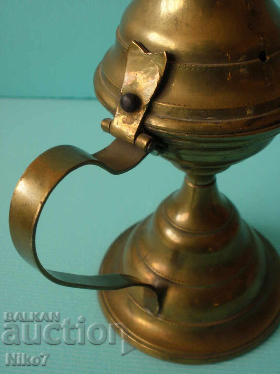 Delivery of Old, solid, brass, table lamp. Incense burner. Delivery of Old, solid, brass, table lamp. Incense burner.