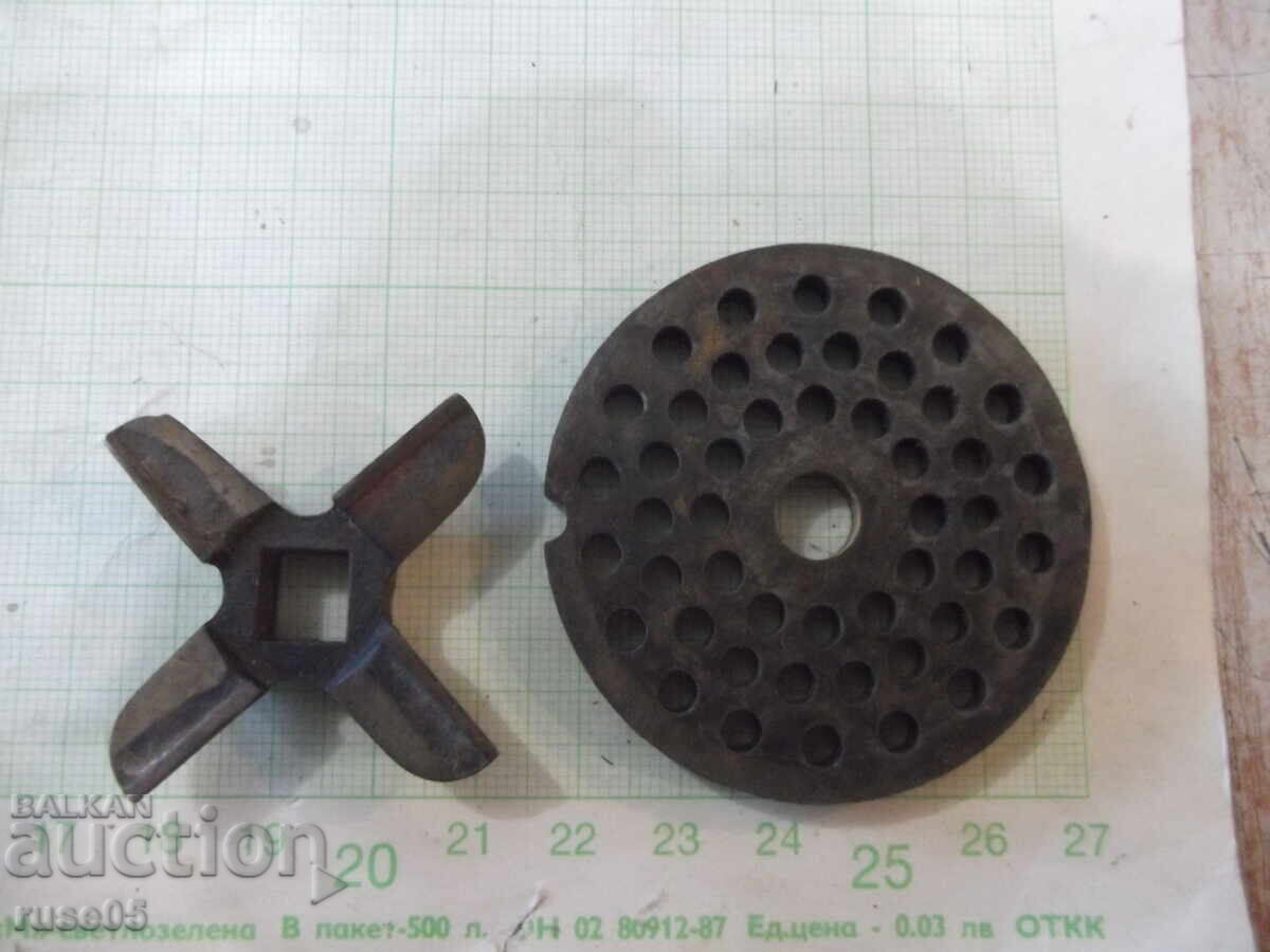 Δημοπρασία Τρίψτε και μαχαίρι από έναν μύλο κρέατος