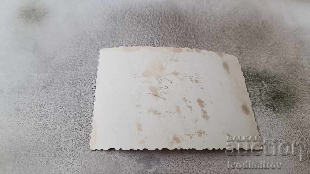 Photo Three men and a woman on the beach with price 1.45 BGN | € 0.74 Photo Three men and a woman on the beach with price 1.45 BGN | € 0.74