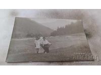 Photo Three girls in the meadow