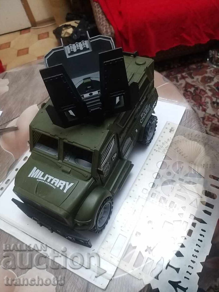 Toy armored jeep.