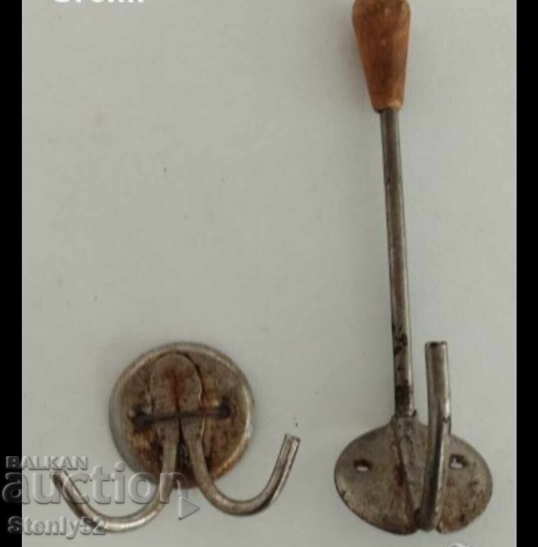 2 old iron hangers.