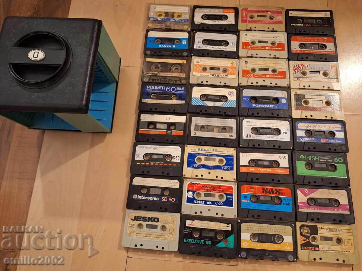 32 audio cassettes in a carousel rack