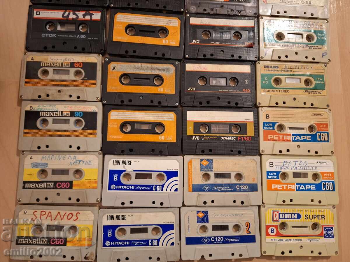 Auction 32 audio cassettes in a carousel rack Auction 32 audio cassettes in a carousel rack
