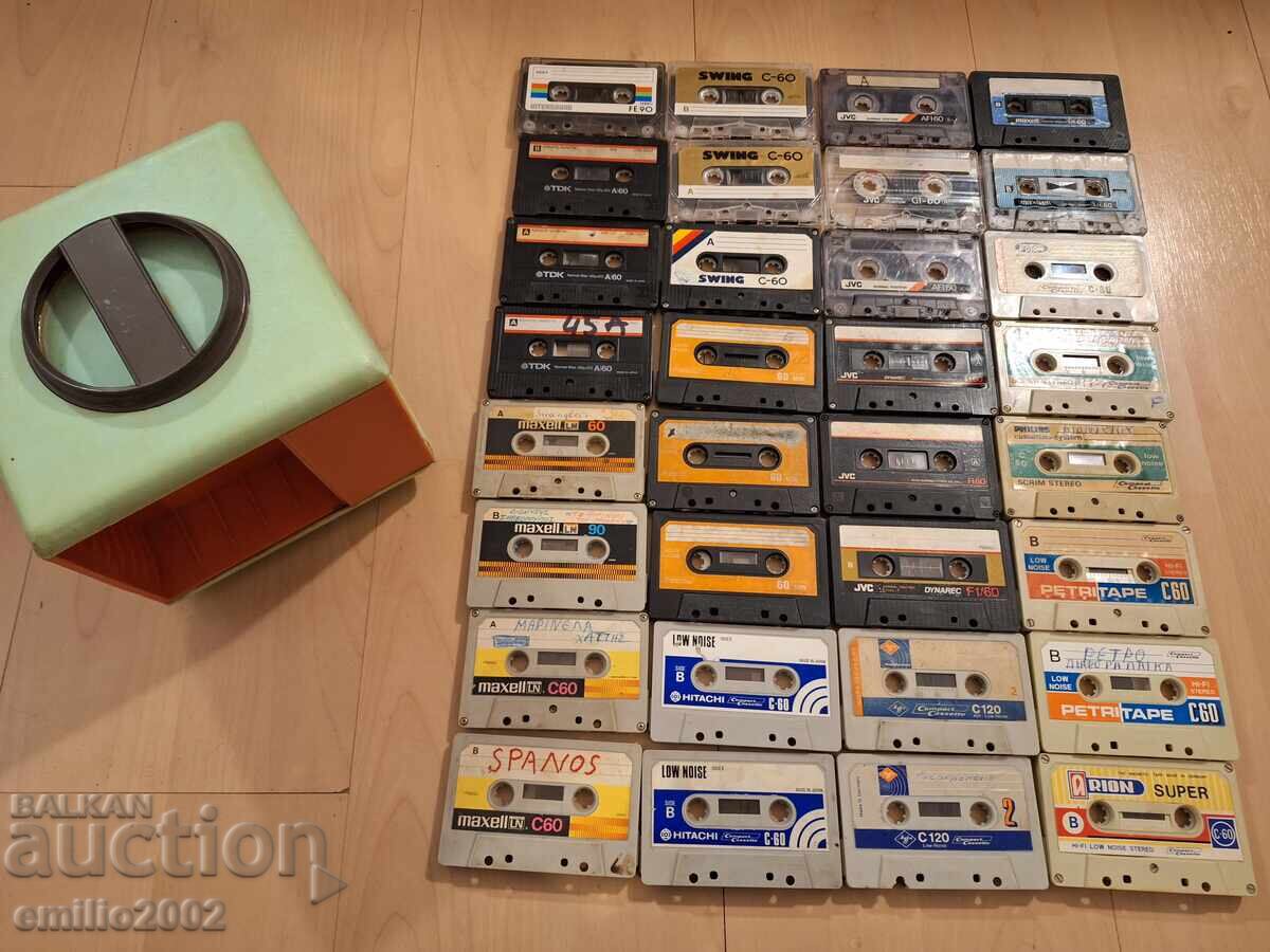 32 audio cassettes in a carousel rack 32 audio cassettes in a carousel rack