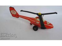 Old metal toy helicopter