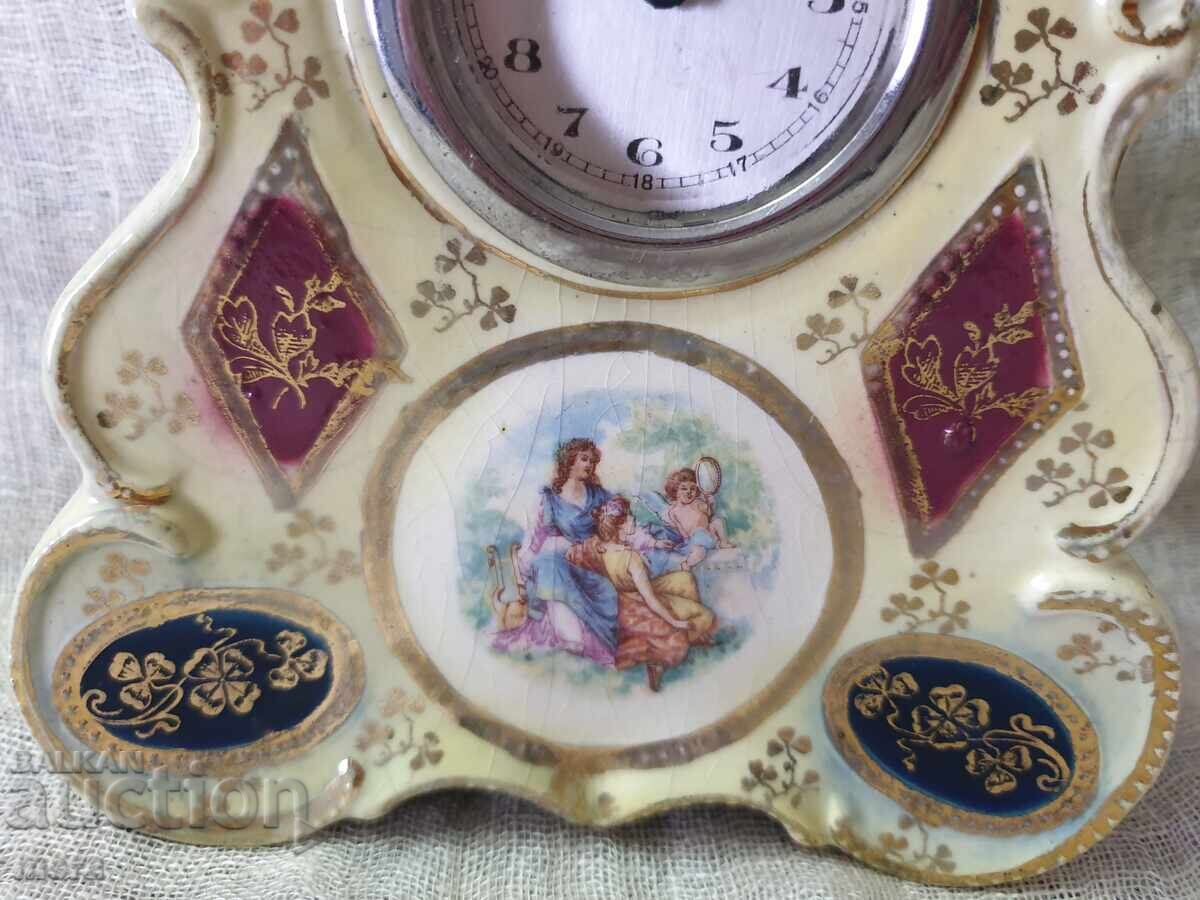Antique Renaissance porcelain mantel clock with price 110.00 BGN | € 56.24 Antique Renaissance porcelain mantel clock with price 110.00 BGN | € 56.24