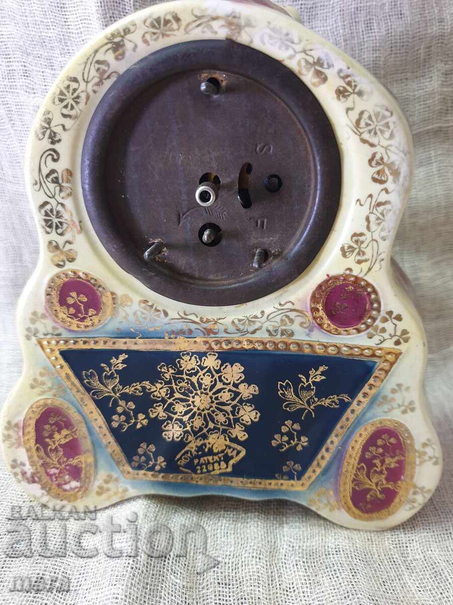 Delivery of Antique Renaissance porcelain mantel clock Delivery of Antique Renaissance porcelain mantel clock
