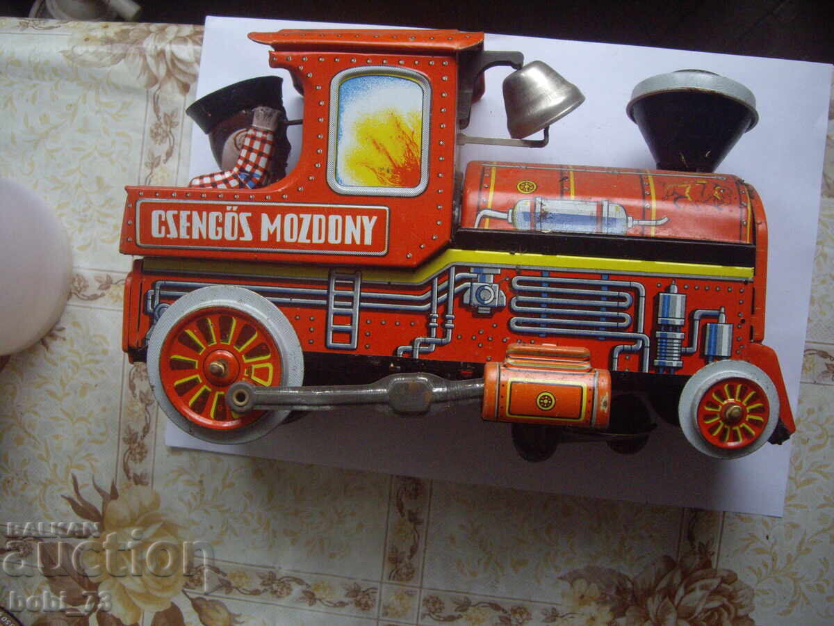 Стара ламаринена играчка. Стара ламаринена играчка.