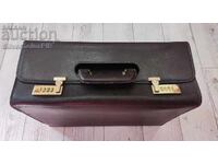 Old suitcase with combination lock