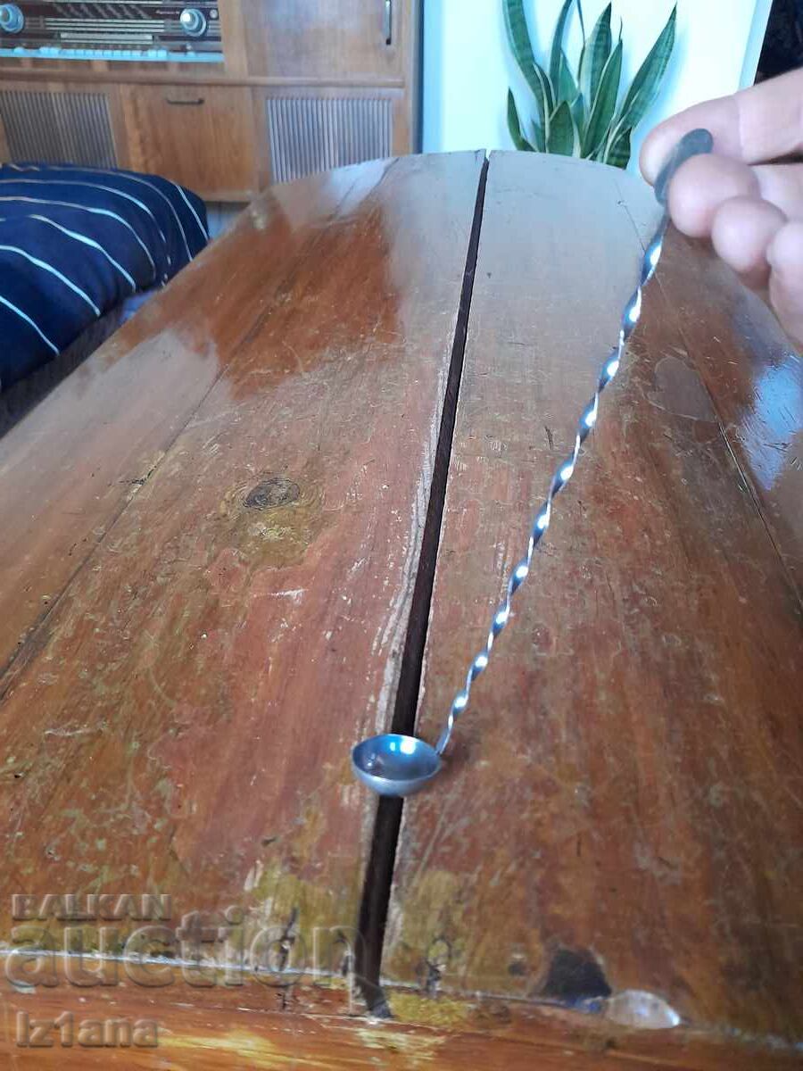 Old spoon for spices, sauces