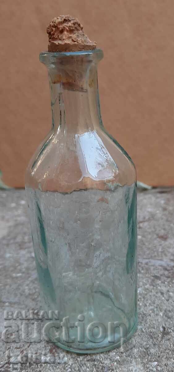 Antique bottle part of a collection Antique bottle part of a collection