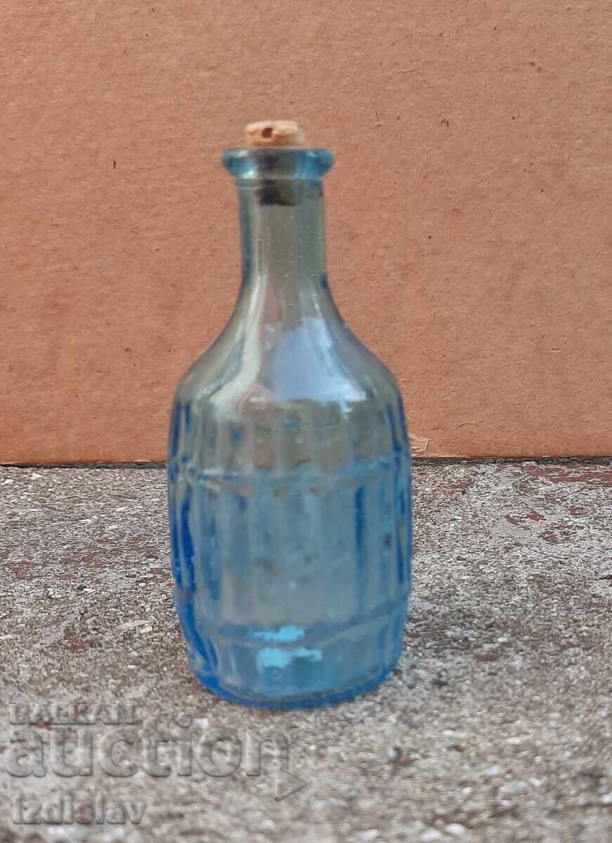 Auction Antique bottle part of a collection Auction Antique bottle part of a collection