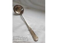 Massive thick silver-plated ladle