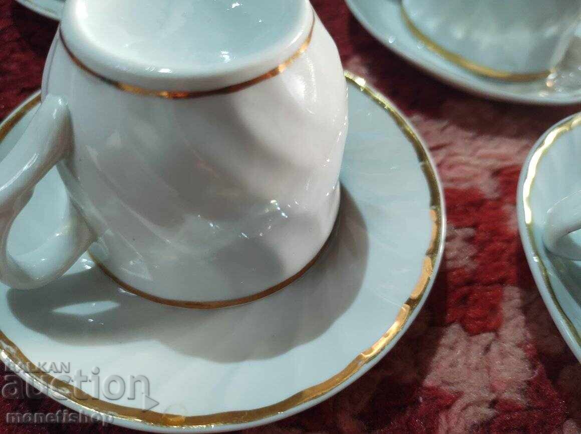 Auction  4 cups with saucers