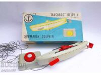 Old toy submarine with original box