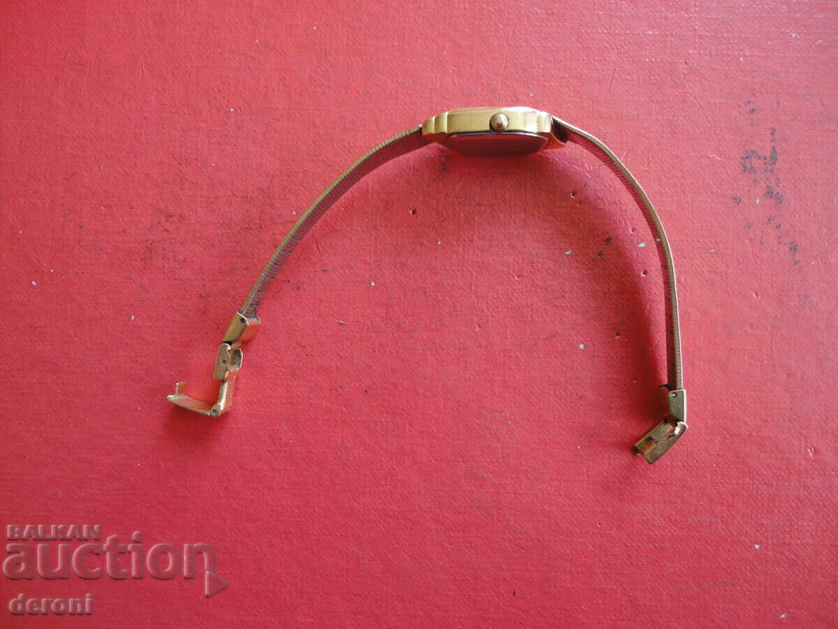 Auction  Gold-plated Swiss watch GM