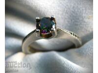 Silver ring with mystic topaz