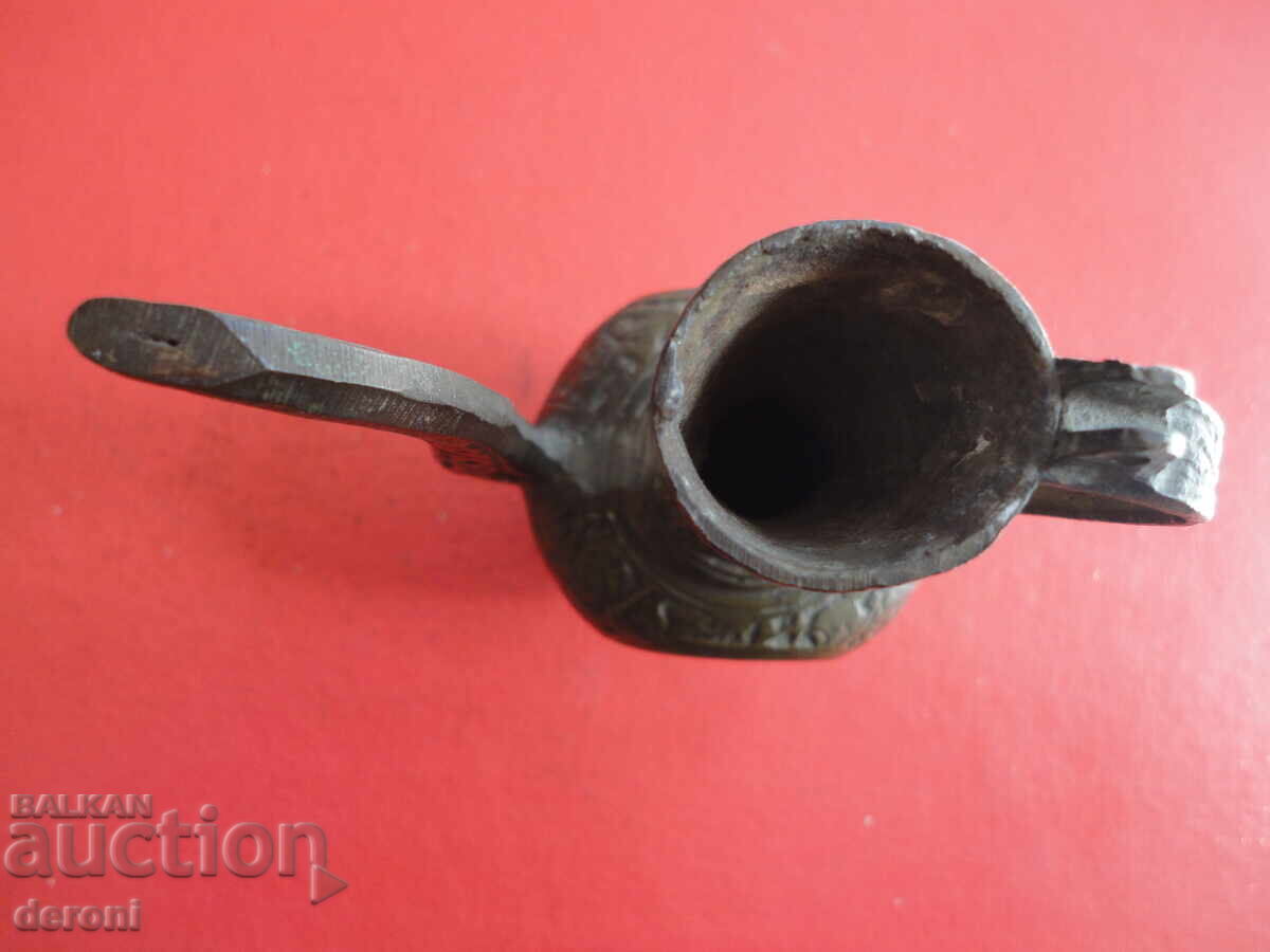 Auction  Bronze ibrik vessel