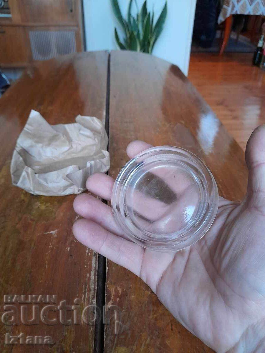 Delivery of Old glass jar lid Delivery of Old glass jar lid