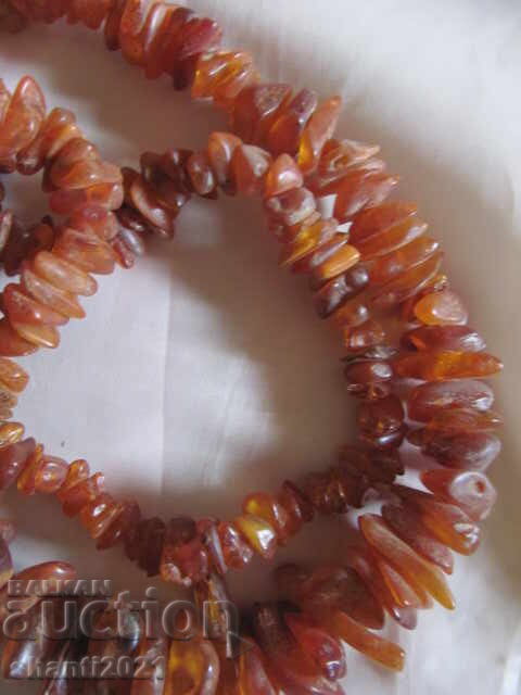 Delivery of Necklace made of raw amber, large beads, length 80cm. Delivery of Necklace made of raw amber, large beads, length 80cm.