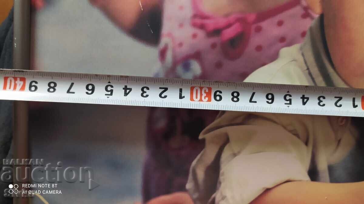 Poster photo of a child with radishes, metal frame 60/40 with price € 2.55 | 4.99 BGN Poster photo of a child with radishes, metal frame 60/40 with price € 2.55 | 4.99 BGN