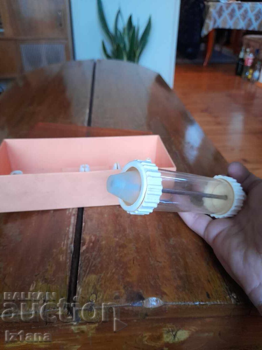 Delivery of An old pastry syringe Delivery of An old pastry syringe