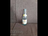 Old bottle of Schweppes Golden Orange