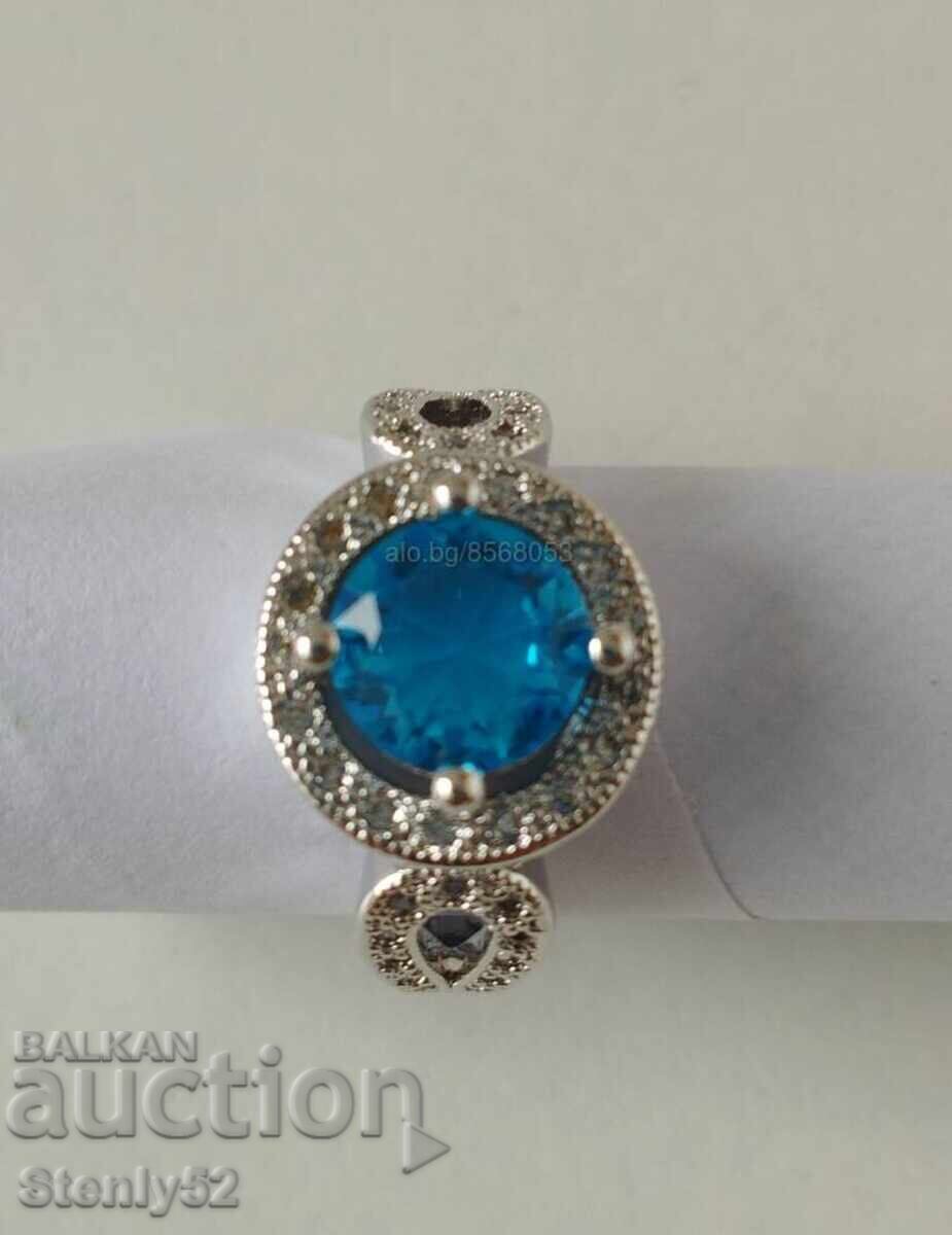 Посребрен пръстен с родиево покритие с естествен камък. Посребрен пръстен с родиево покритие с естествен камък.