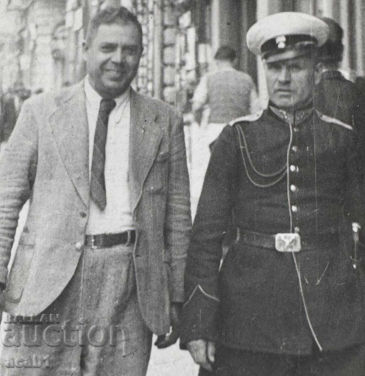 Auction Officer and Friend on the Streets Auction Officer and Friend on the Streets