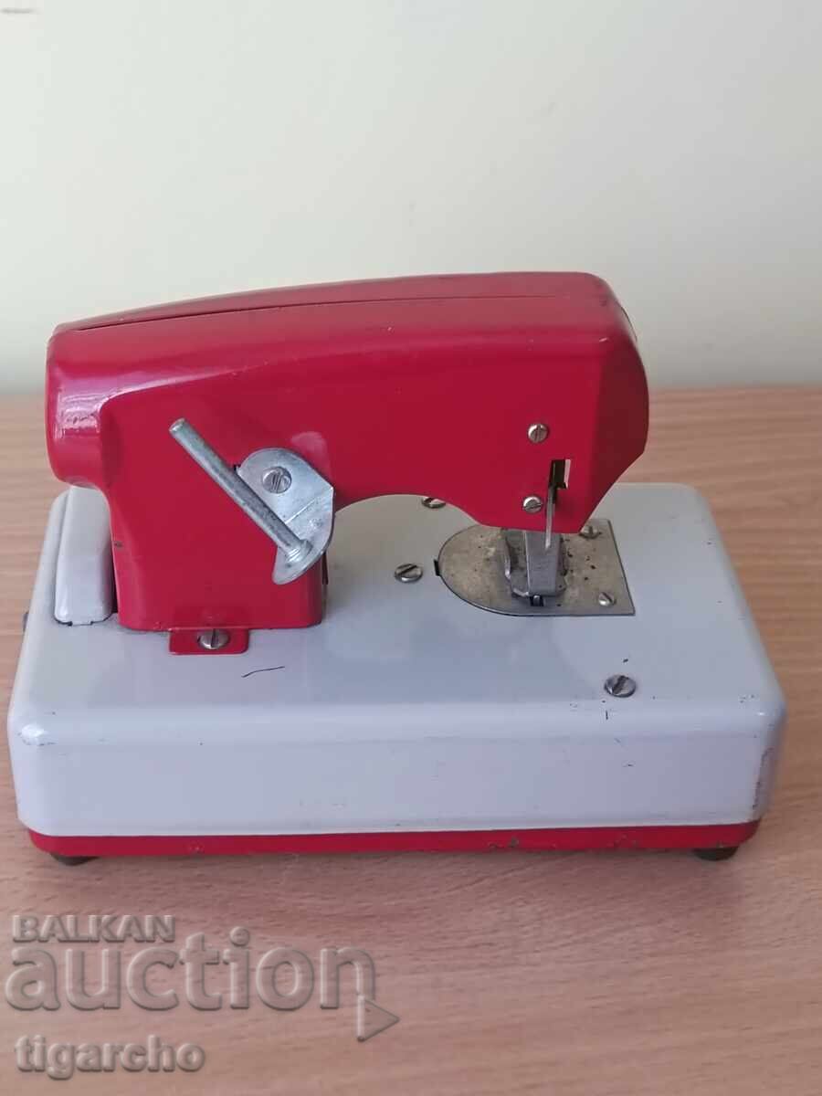 Auction  An old tin toy