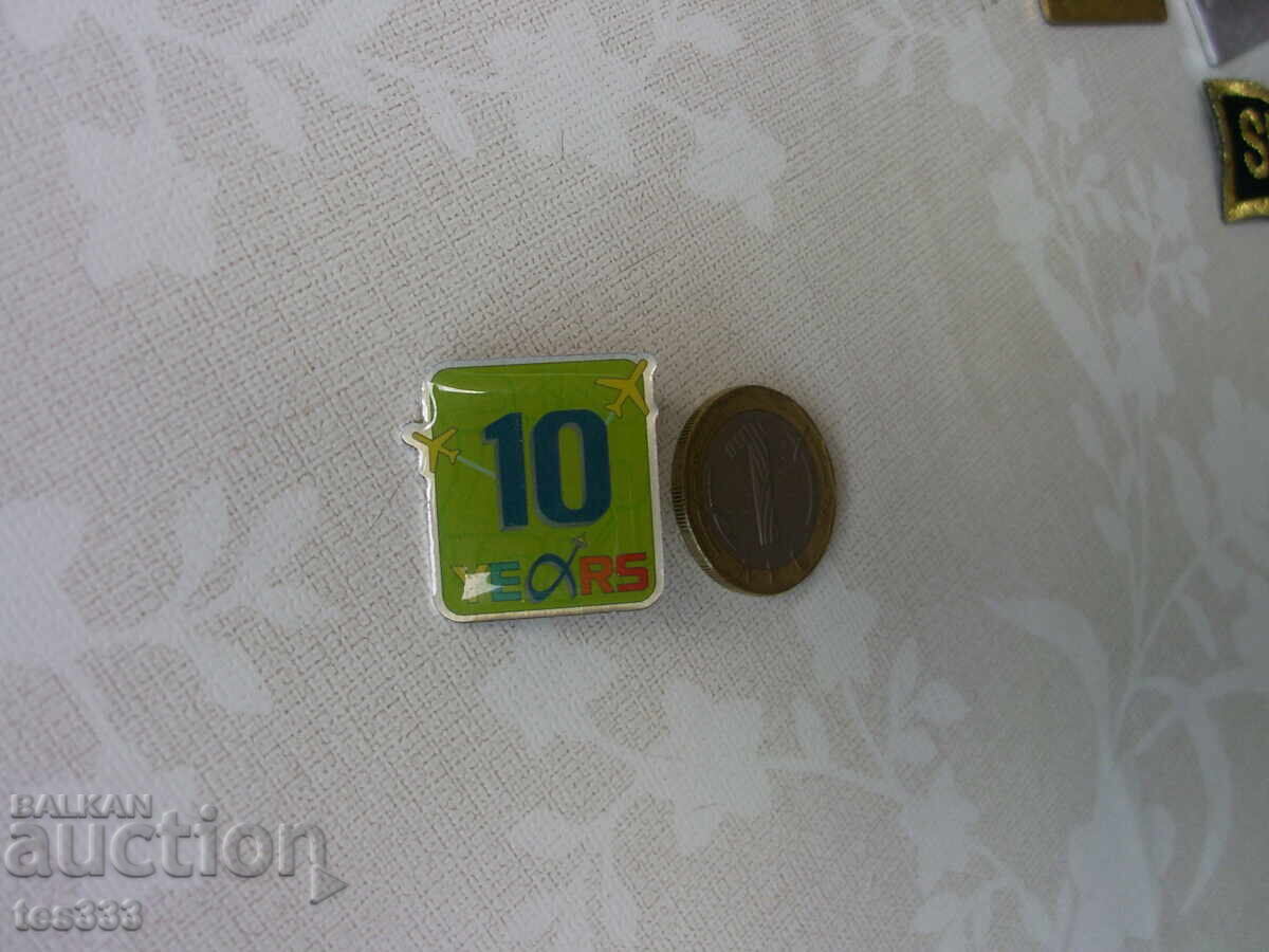 10 years Athens International Airport pin badge with price € 0.77 | 1.51 BGN