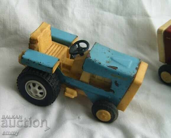 Delivery of Tractor MIR - old toy, metal and plastic - 2 pieces Delivery of Tractor MIR - old toy, metal and plastic - 2 pieces