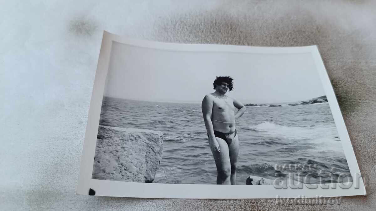 Photo Young man on the beach