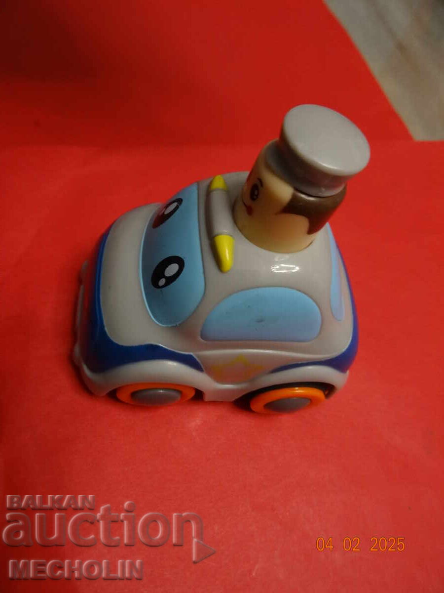 Delivery of OLD RETRO TOY POLICEMAN