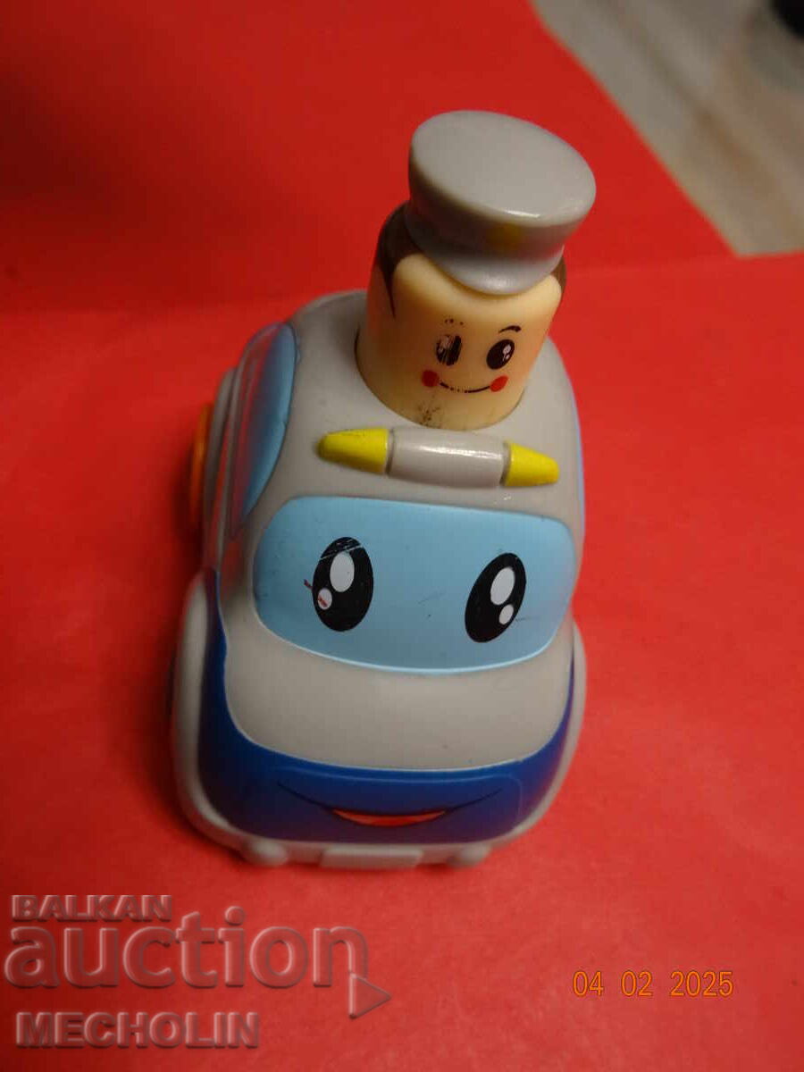 OLD RETRO TOY POLICEMAN