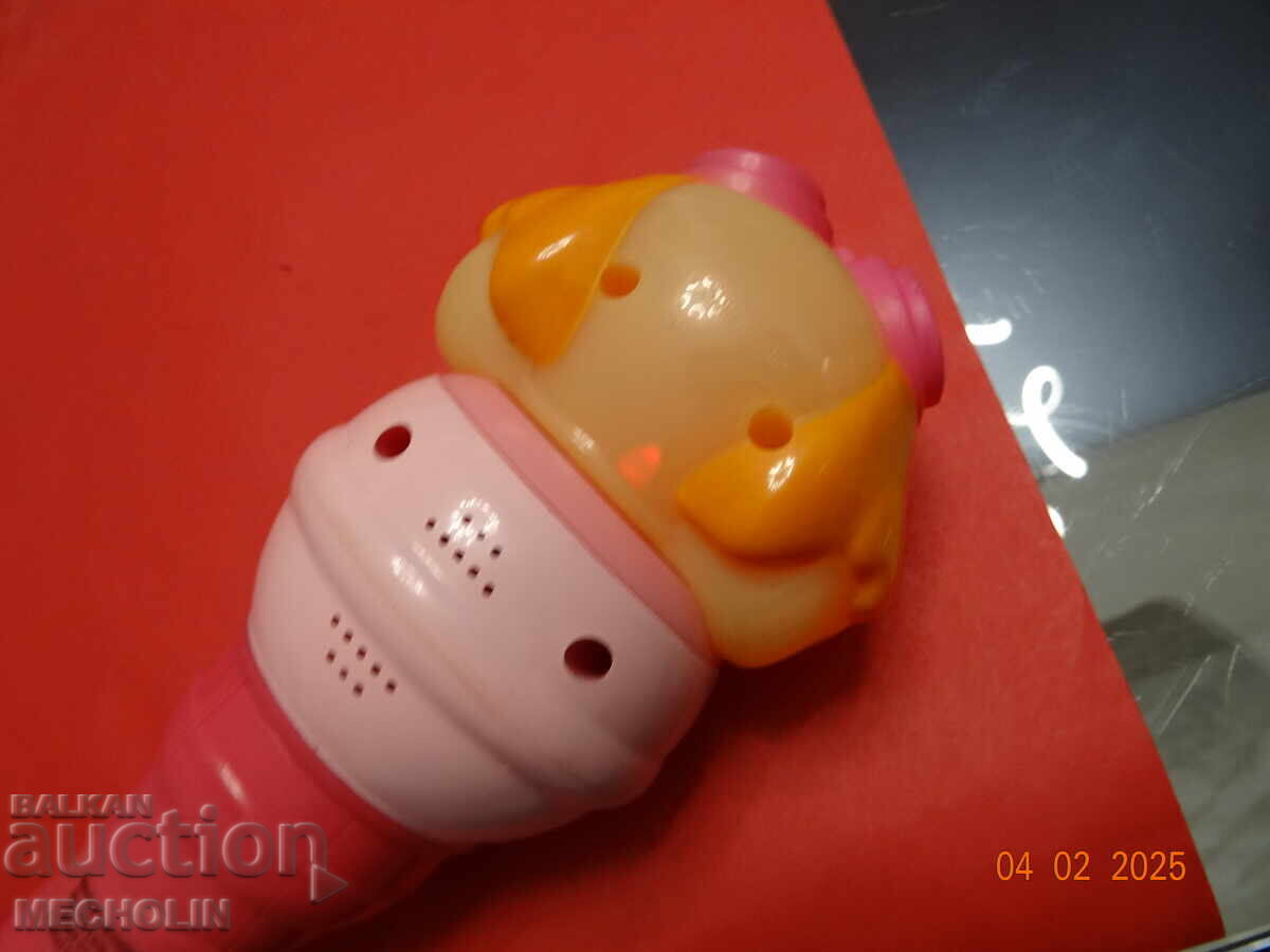 Delivery of OLD RETRO TOY BABY MICROPHONE Delivery of OLD RETRO TOY BABY MICROPHONE
