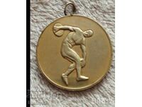 Medalie pentru aruncarea discului