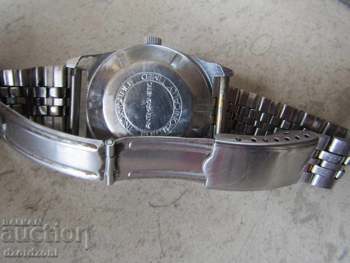 Delivery of Swiss watch MOVADO