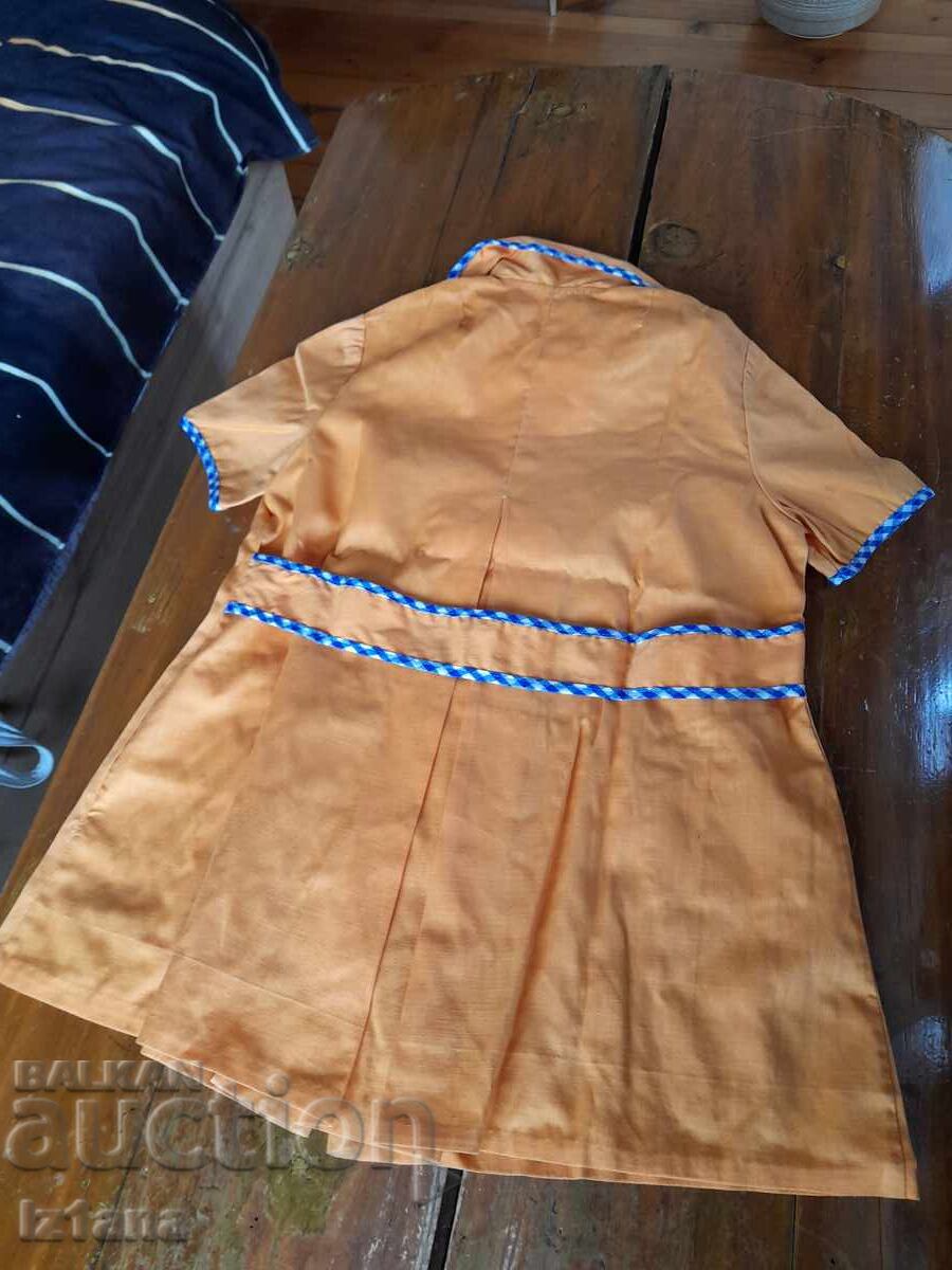 Livrarea șorț vechi de grădiniță