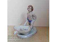 Porcelain figure boy with stroller SIP