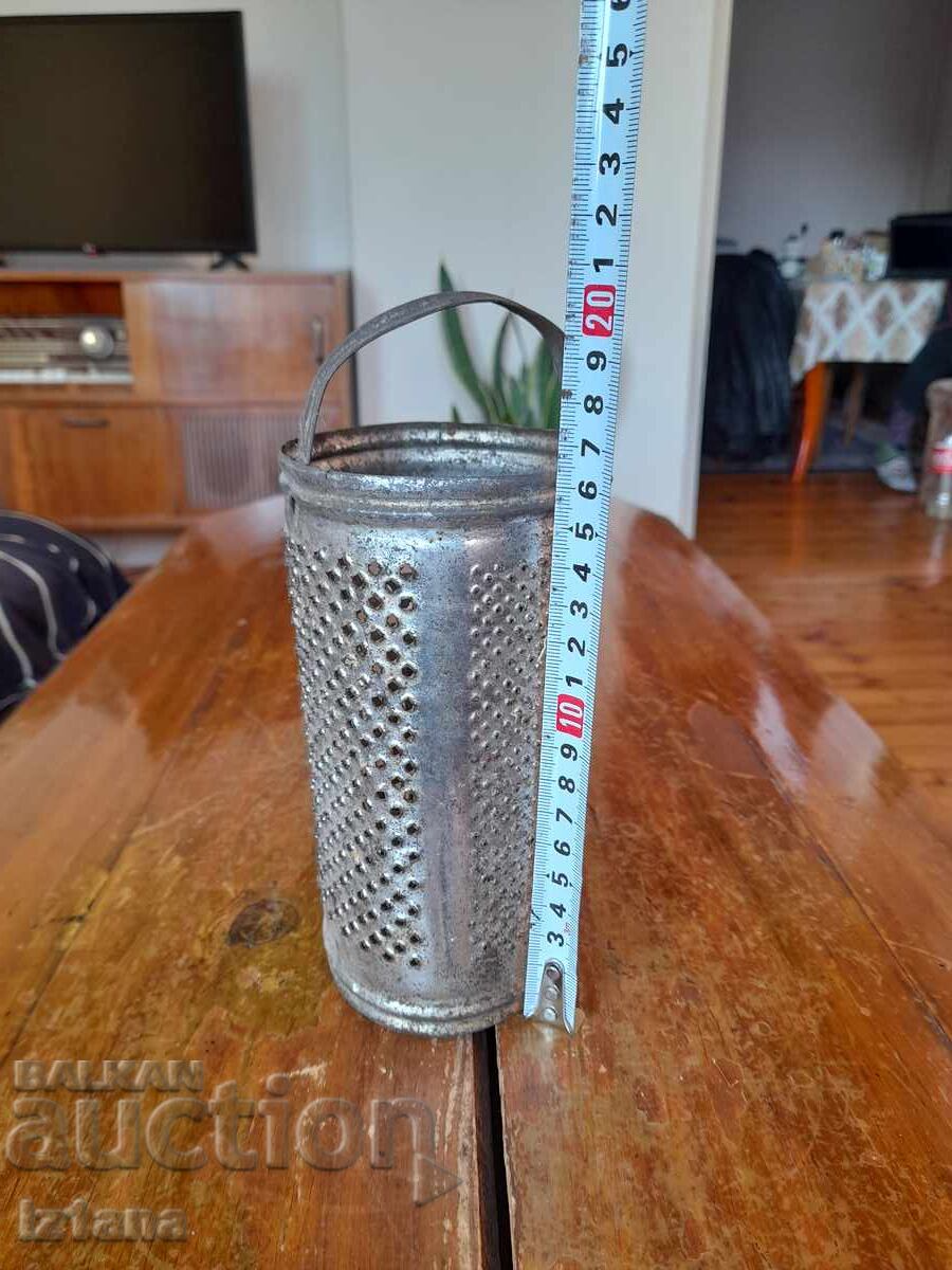 Delivery of An old kitchen grater Delivery of An old kitchen grater