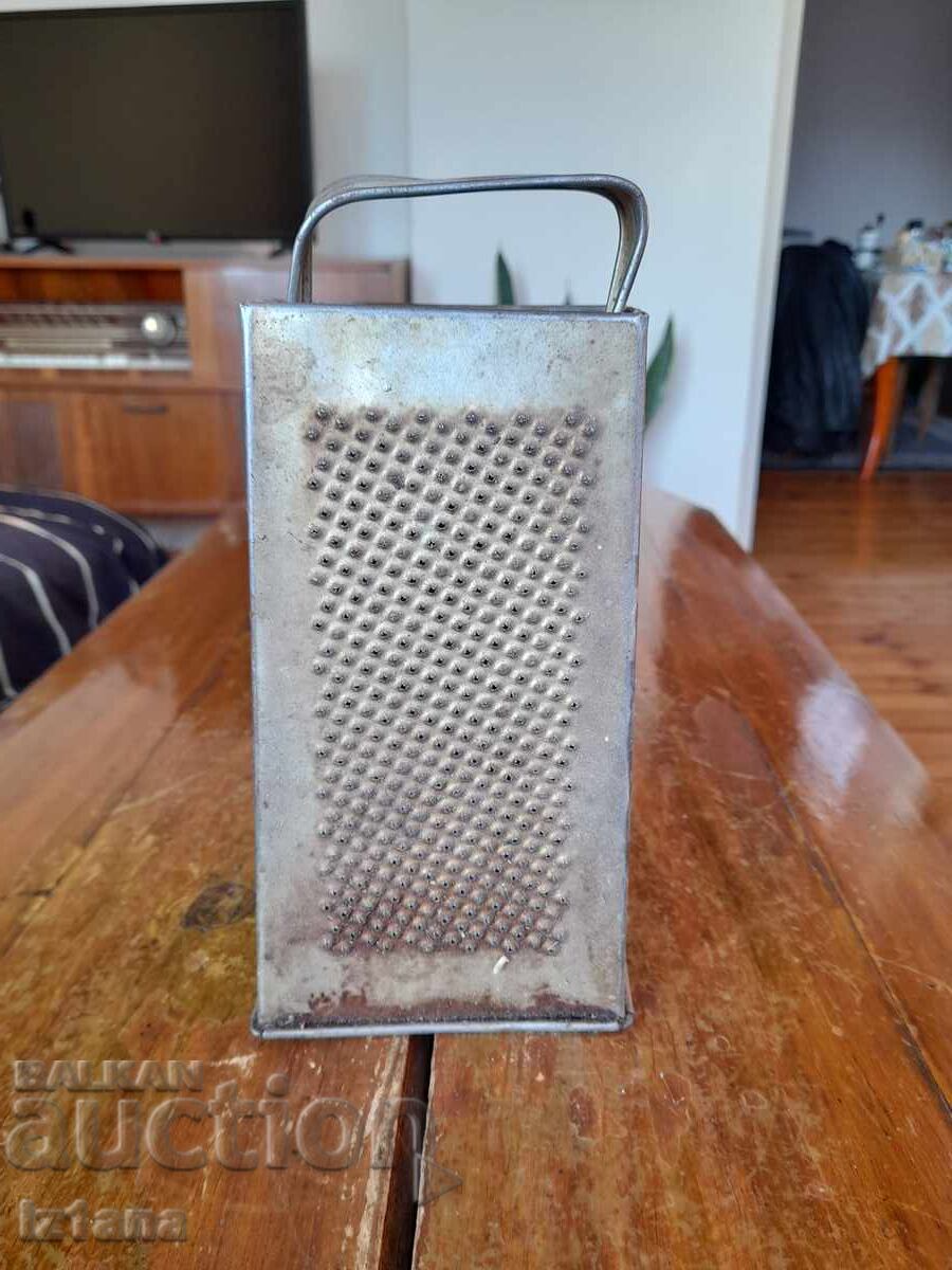 Auction An old kitchen grater Auction An old kitchen grater