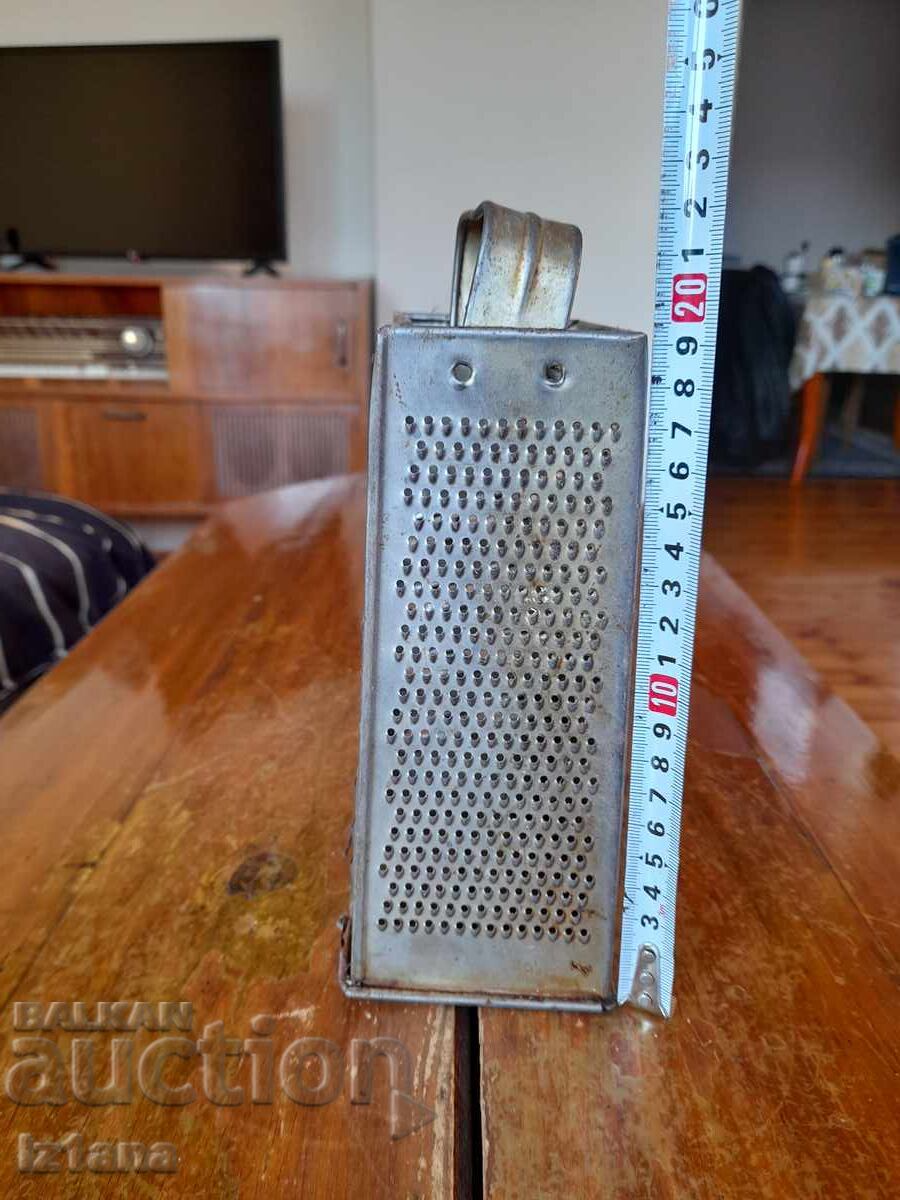 Delivery of An old kitchen grater Delivery of An old kitchen grater