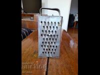 An old kitchen grater