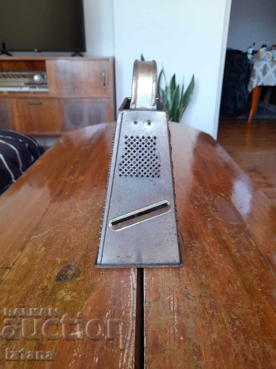 An old kitchen grater with price 22.00 BGN | € 11.25 An old kitchen grater with price 22.00 BGN | € 11.25