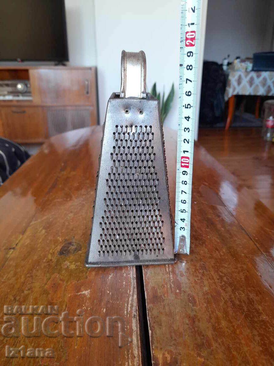 Delivery of An old kitchen grater Delivery of An old kitchen grater