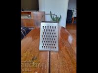 An old kitchen grater