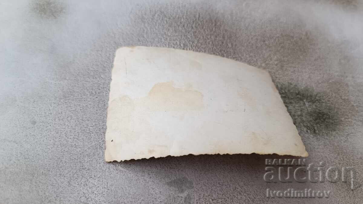 Photo Woman and two young girls lying on a stone in the sea with price 1.85 BGN | € 0.95 Photo Woman and two young girls lying on a stone in the sea with price 1.85 BGN | € 0.95