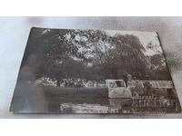 Photo Plovdiv Three men and a little boy with a boat in the lake